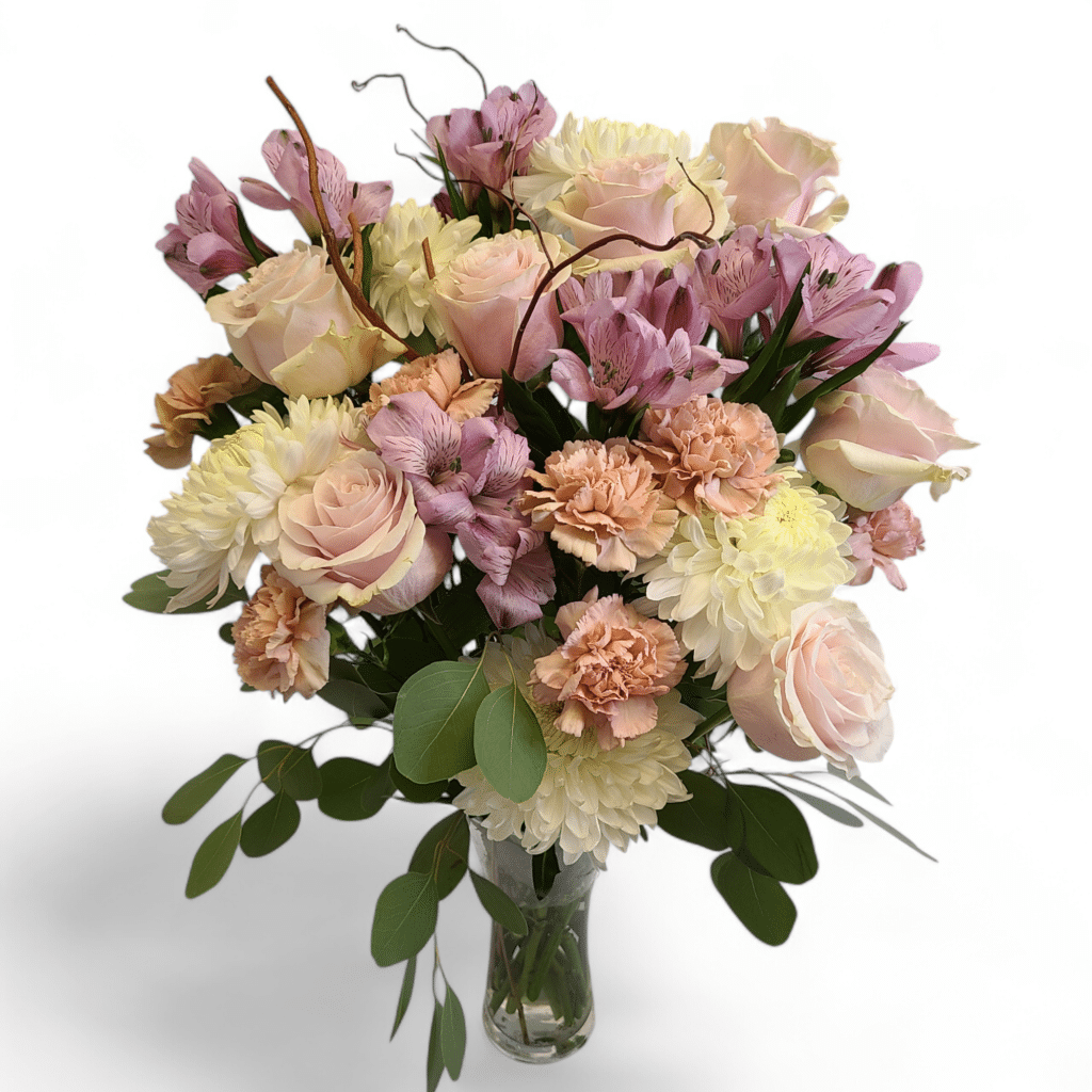 Creamy Dreamy Flower Arrangement - Florist Atropa Belladonna A bouquet with creamy tones, lush and beautiful. Flowers arranged in a trumpet vase, with branches and eucalyptus.