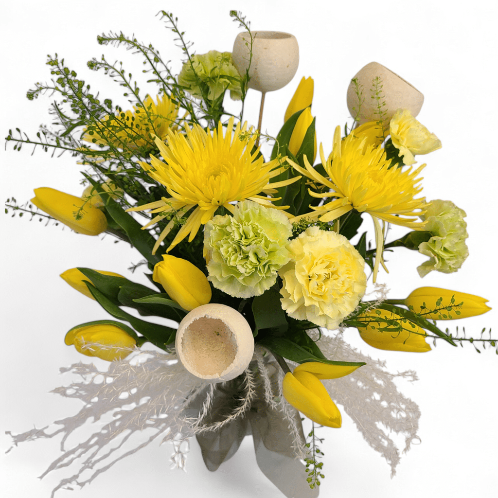 Lemon Drop Close Up - Florist Atropa Belladonna Close up on this bright yellow bouquet, with tulips, fuji and dianthus; with movement from the thlapsi and dried textural elements