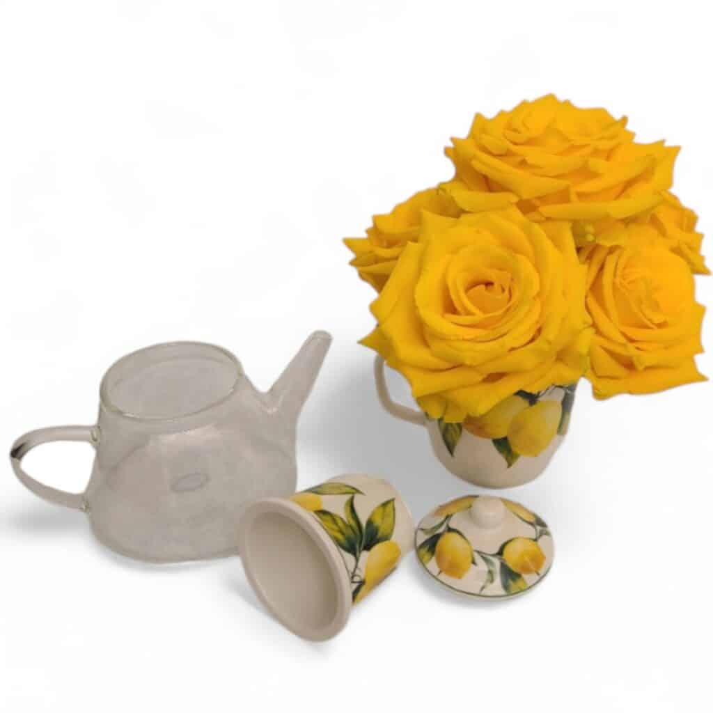 Matinee Parfaite full display - Florist Atropa Belladonna Lemon Mug and Clear Pot with Lemon design steeper insert; with yellow roses in the mug. Steeper and lid removed and open for full display